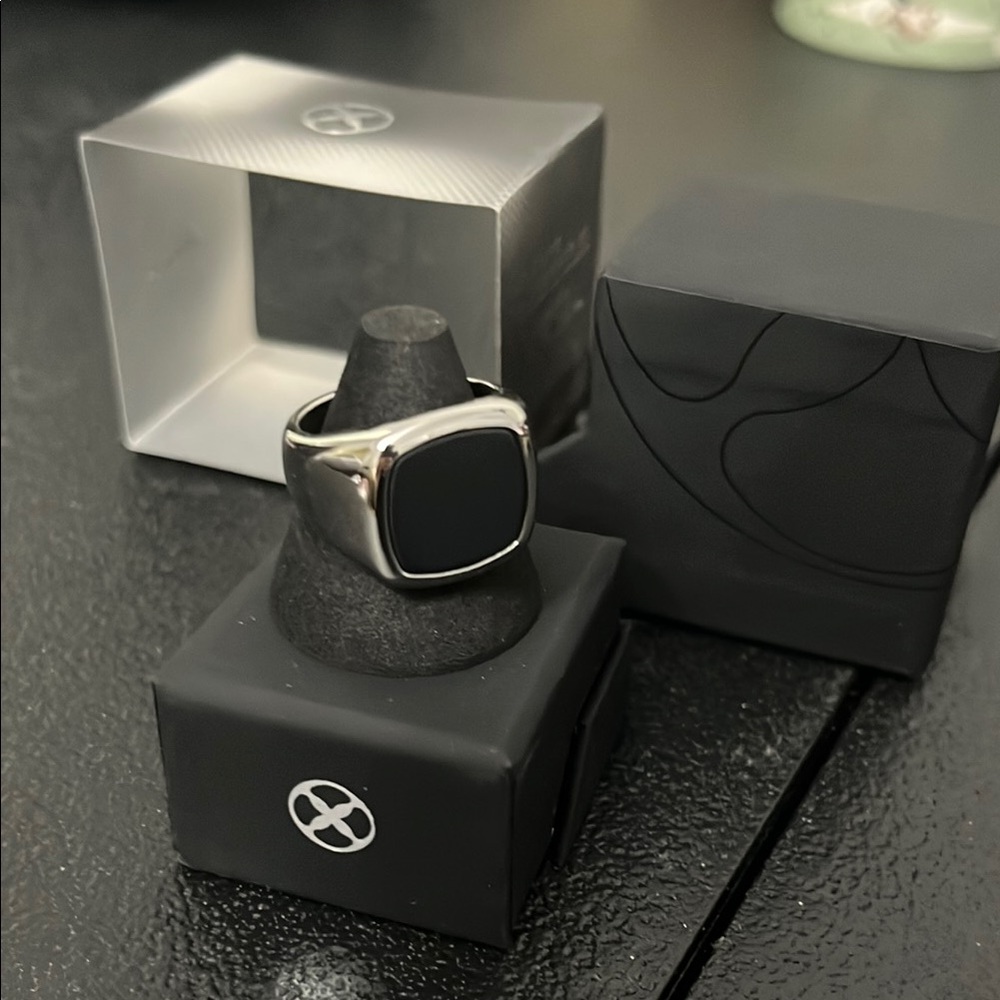 Sleek Silver and Black Jewelry Accessory